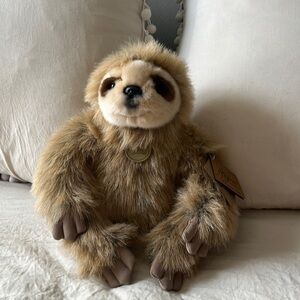 Aurora sloth plushie